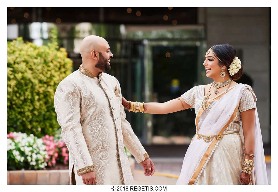 Archana and Gopal sharing a smile outside Hilton McLean Tysons Corner.