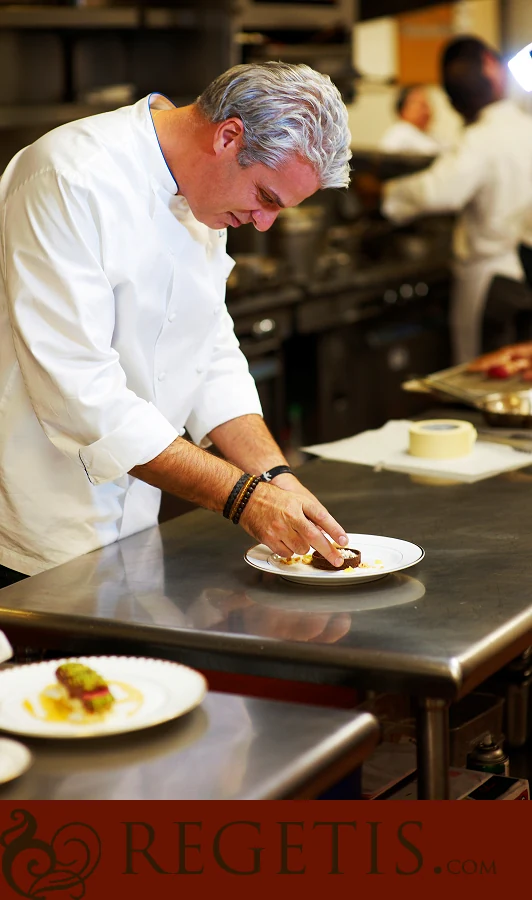 Chef Eric Ripert plating a course for the dinner at The Ritz-Carlton, Washington, D.C.