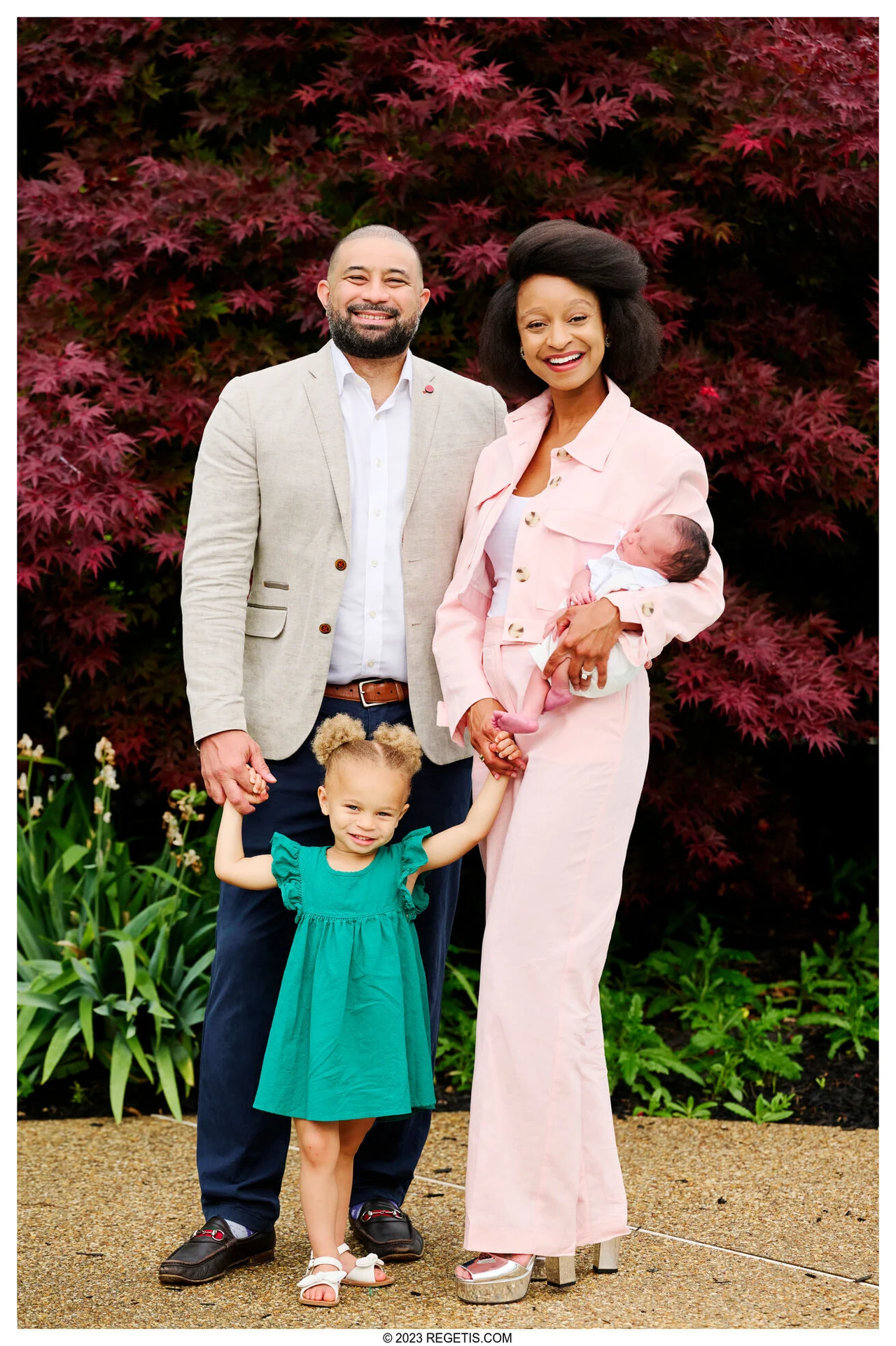 Sydnae and Sean’s family photographed outdoors by The Regeti’s