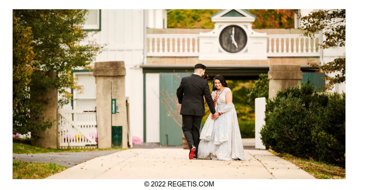 Gurvina and Akshay holding hands and looking back together at Morven Park