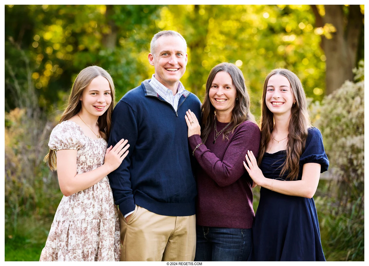 A family of four together in warm autumn light in Warrenton, photographed by The Regeti’s