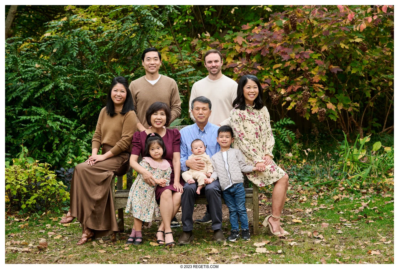 A multigenerational family gathered together outdoors at McCrillis House and Gardens, photographed by The Regeti’s