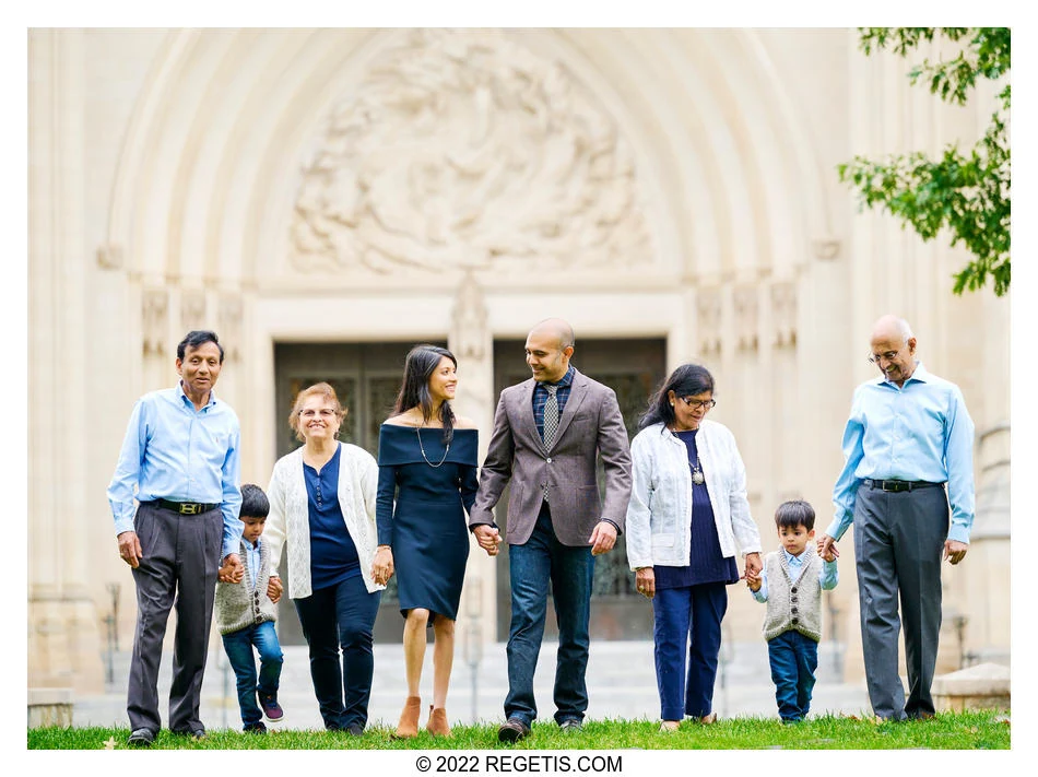 Raj and Rajul walking with their children and parents in front of the National Cathedral, photographed by The Regeti’s